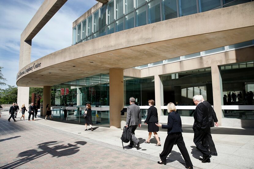 Mourners arrived at the Morton H. Meyerson Symphony Center for the memorial service of...