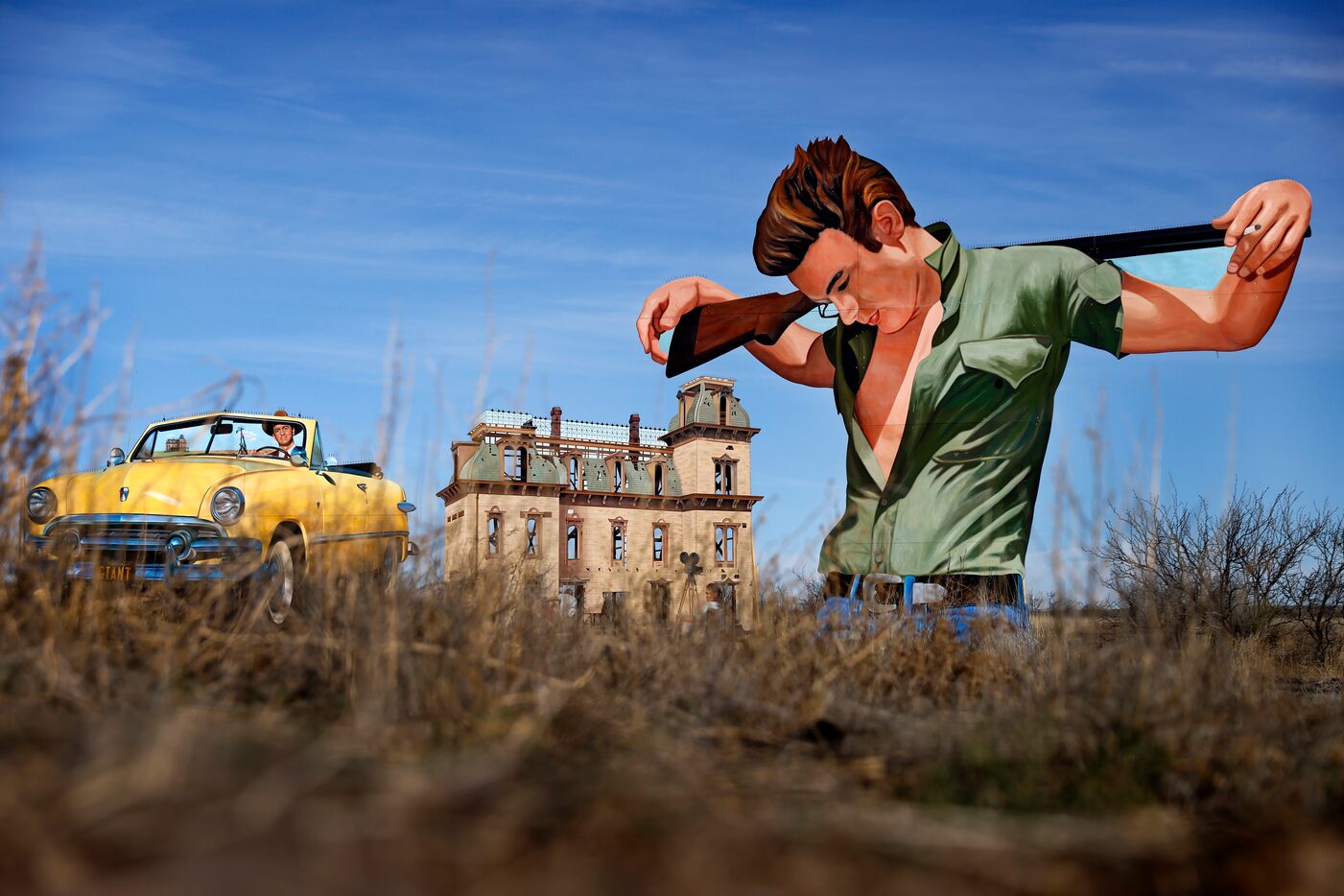 A larger-than-life, standing mural of James Dean and other parts of the Giant Marfa Mural...