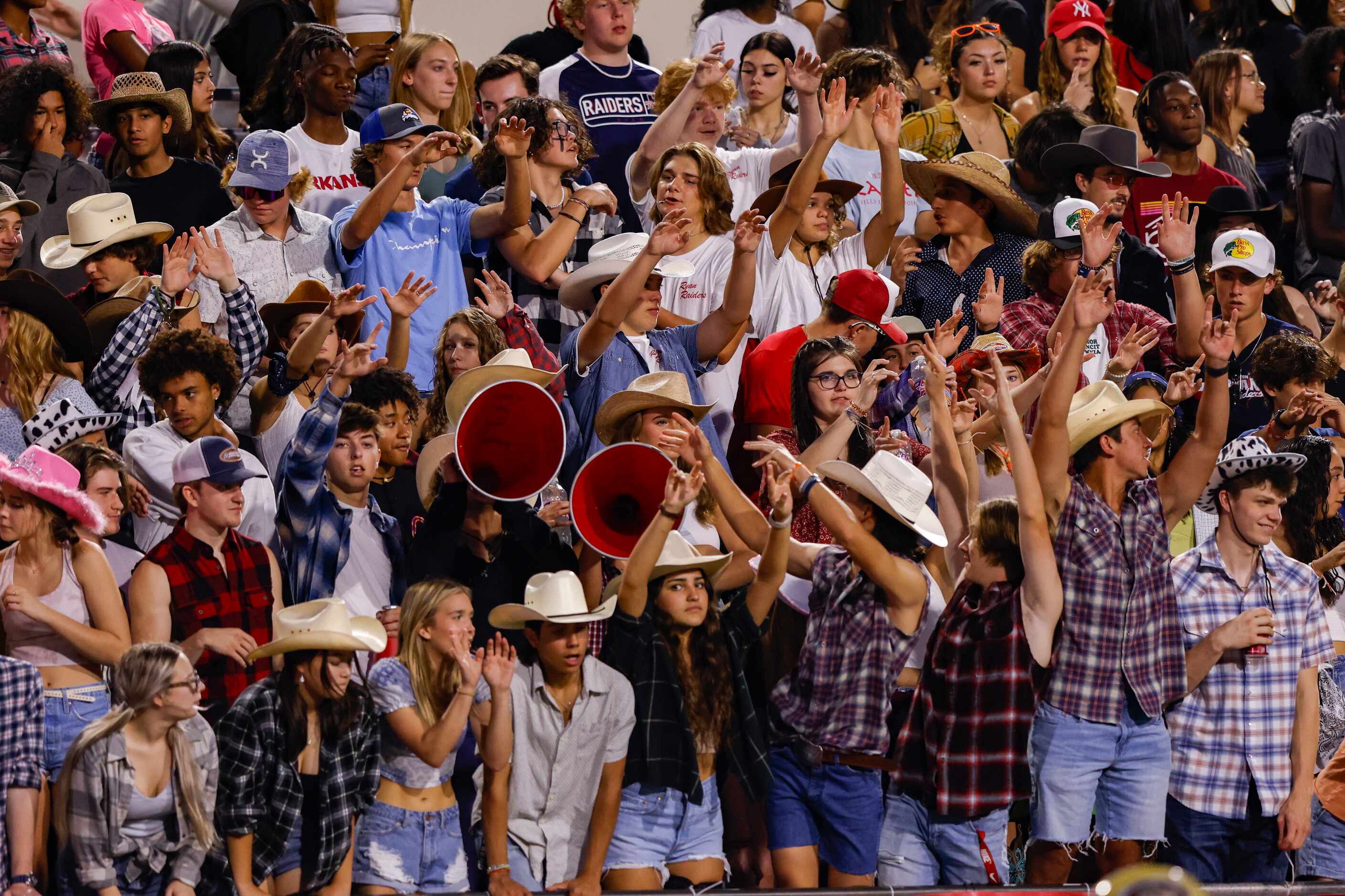 The Denton Ryan student section during the second quarter of a District 3-5A Division I game...