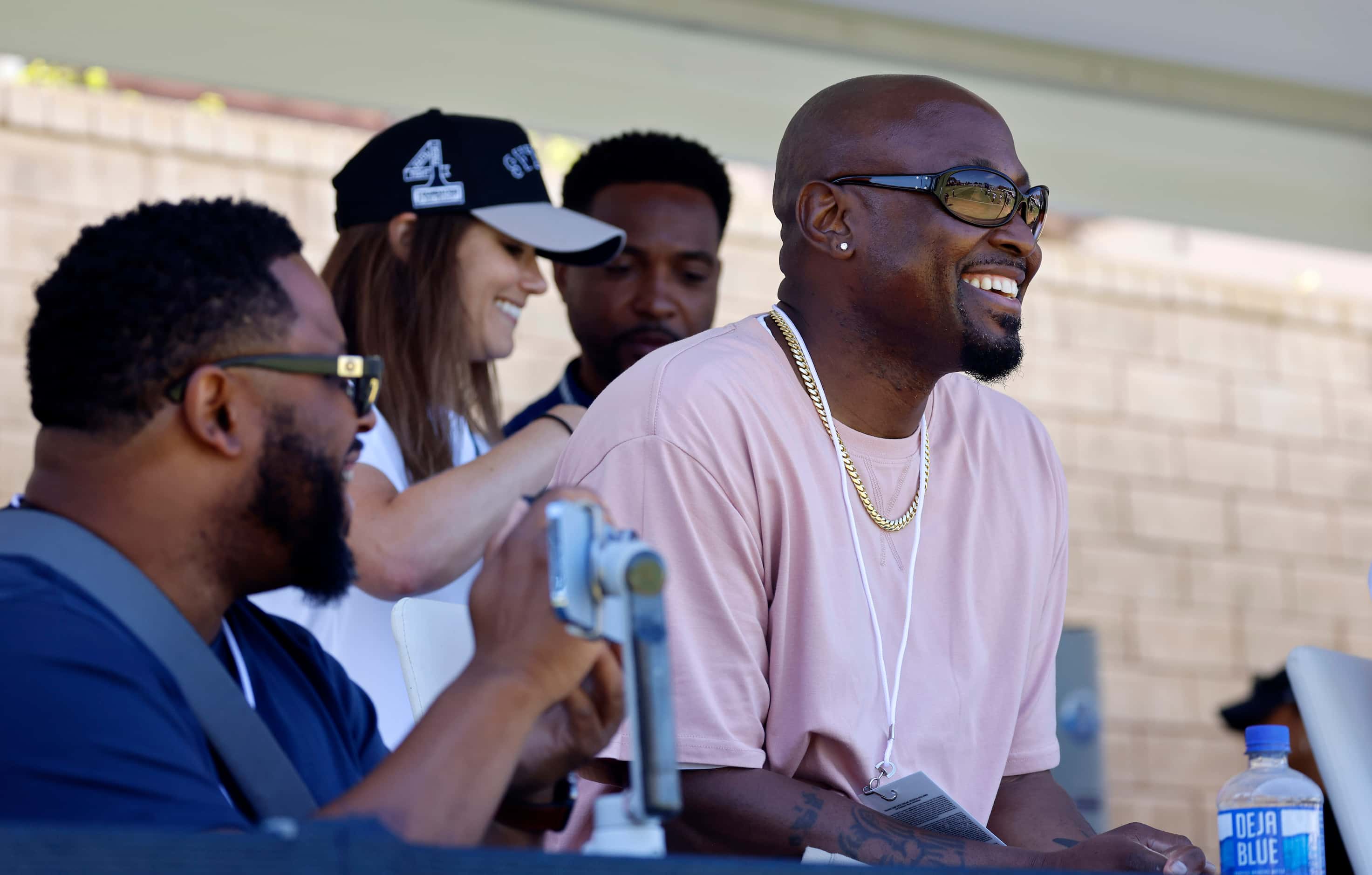 Dallas Cowboys fan, actor and rapper Omar Epps (right) visited training camp practice to...