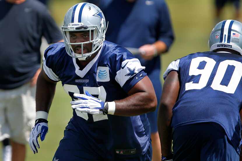 Dallas Cowboys defensive tackle Terrell McClain (97)  runs through a defensive drill during...