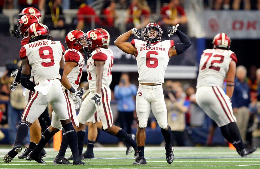 Oklahoma Sooners cornerback Tre Brown (6) flexes his muscles after his sack and safety of...