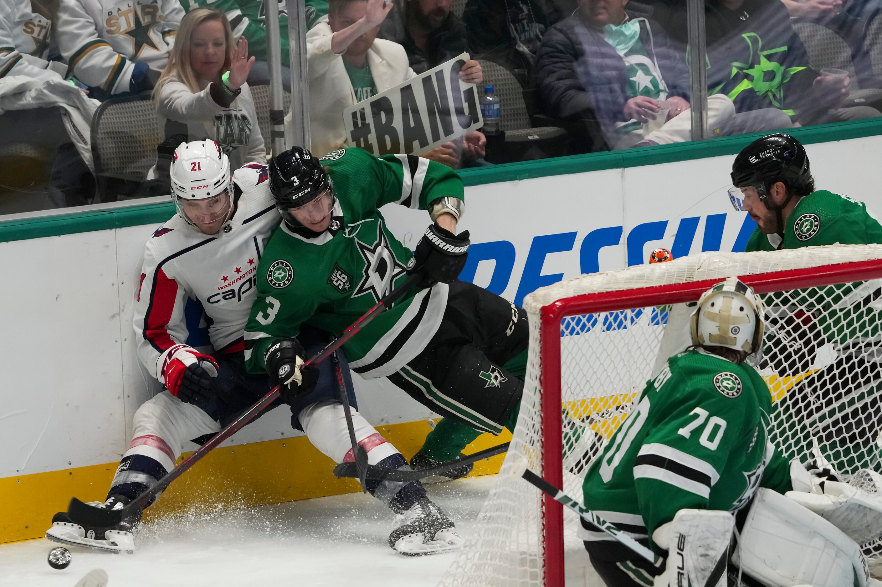 Dallas Stars defenseman John Klingberg (3) fights for the puck with Washington Capitals...