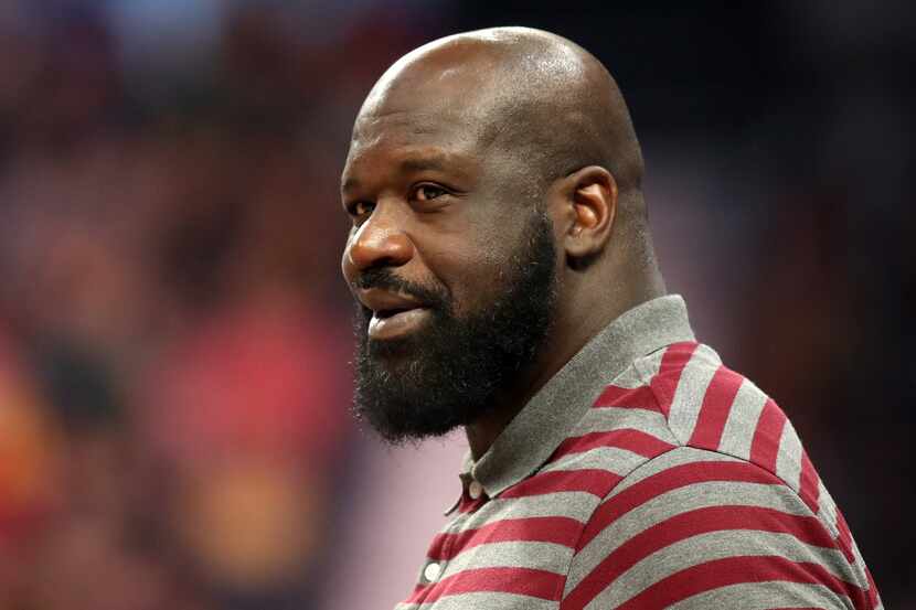 Shaquille O'Neal attends the second preseason NBA game between Atlanta Hawks and Milwaukee...
