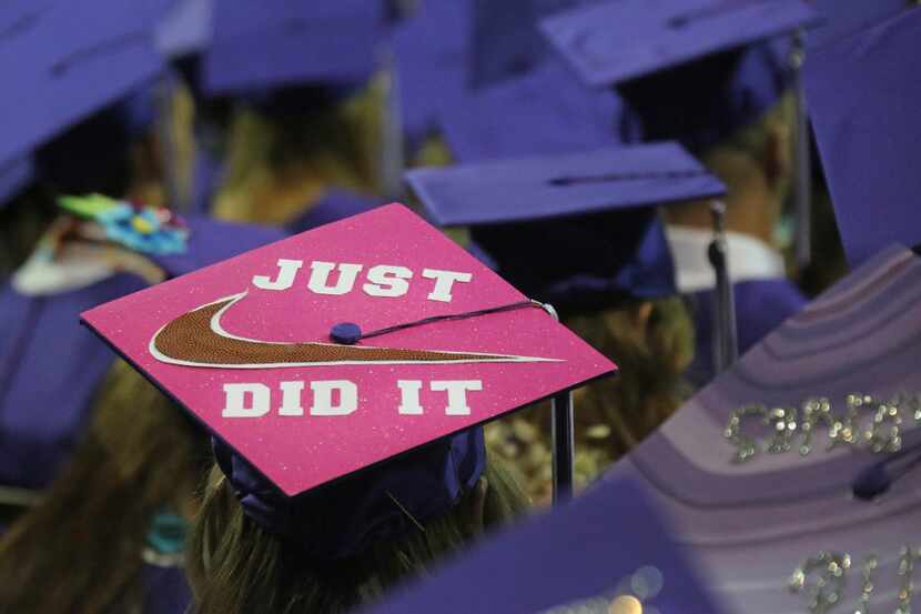 Graduates hats are decorated at the TCU commencement held in Fort Worth on Saturday, May 13,...