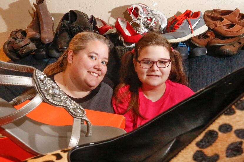 Brandy Lasater and her daughter, Emma,13, have collected more than 8,575 pairs of shoes from...