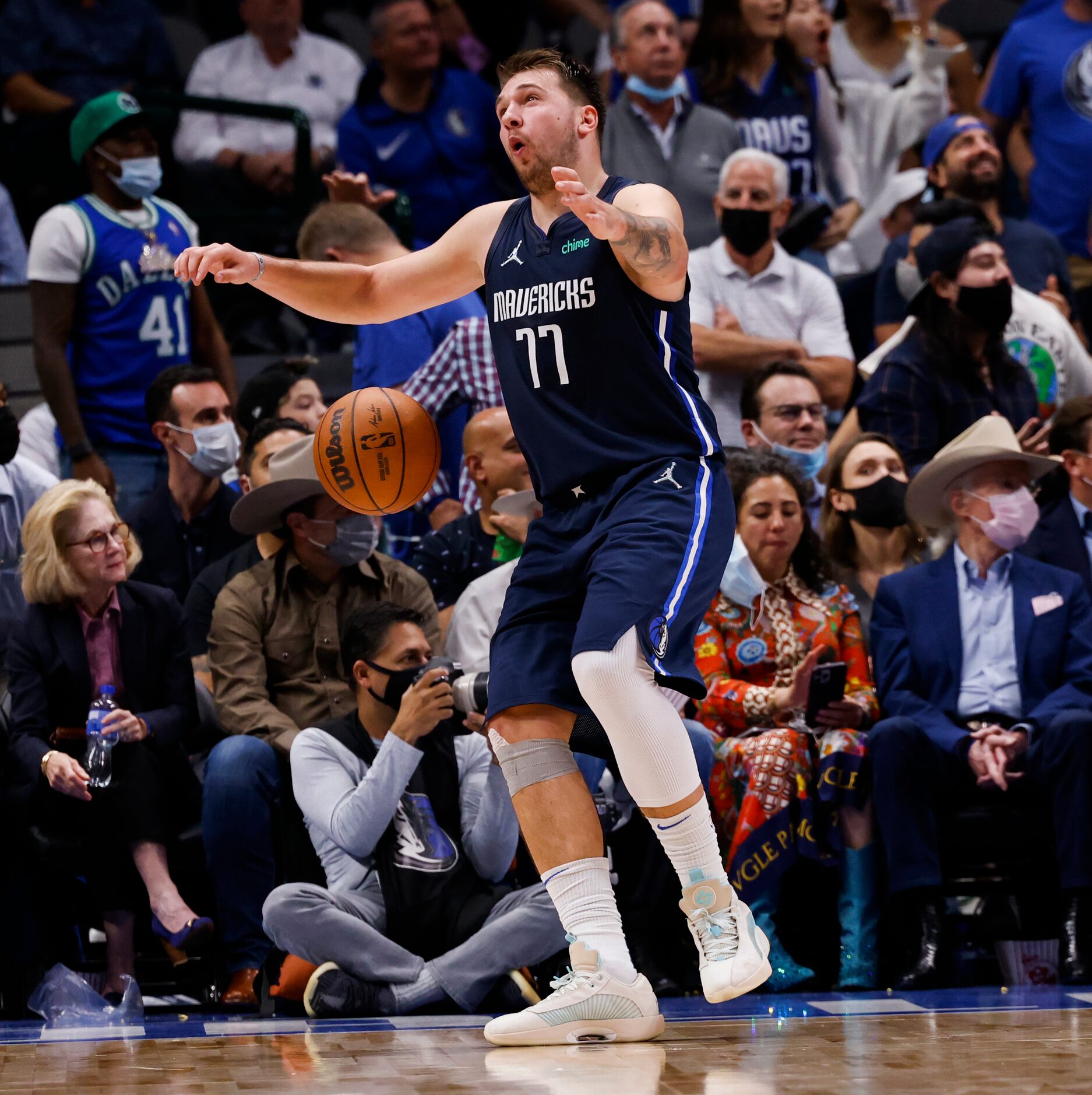 Dallas Mavericks guard Luka Dončić (77) reenacts a fall during the fourth quarter of the...