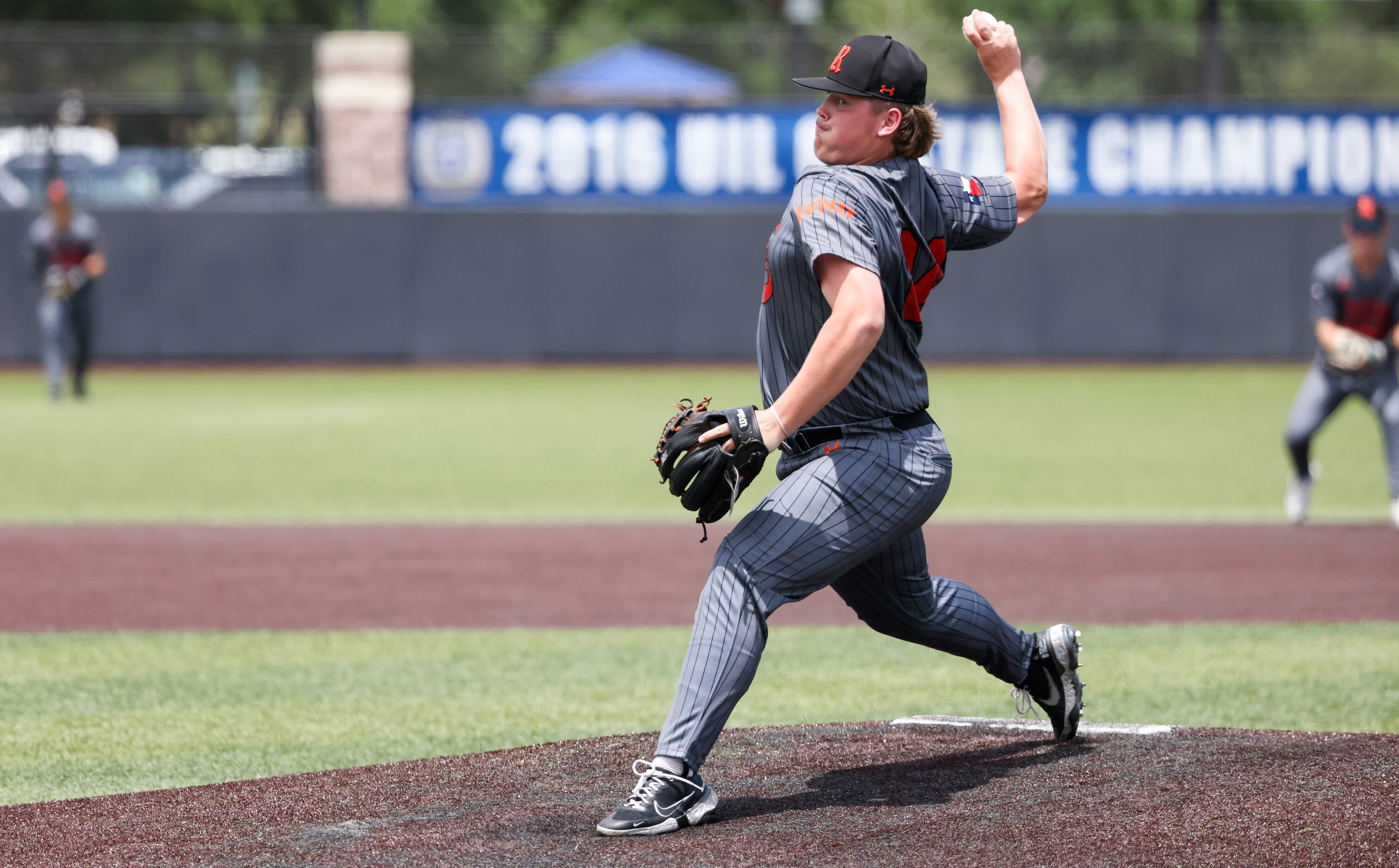 Rockwall junior pitcher Keller Lindeman winds up for a strike in the final inning of an area...