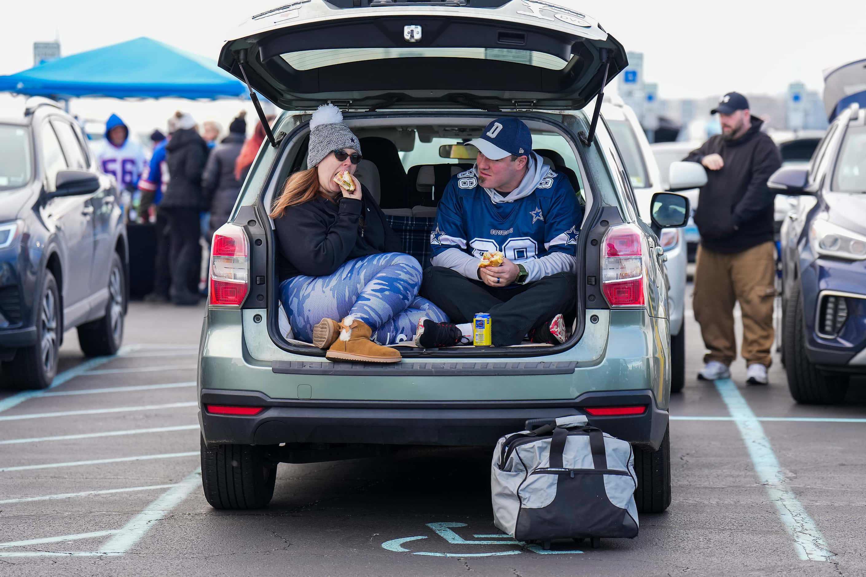 Dallas Cowboys fans tailgate before an NFL football game against the New York Giants on...