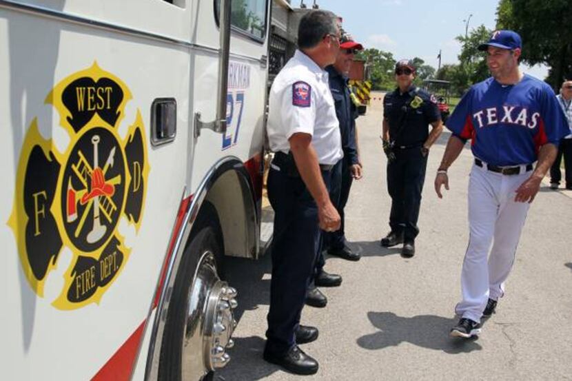Rangers designated hitter Lance Berkman will donate a used firetruck to the West Volunteer...