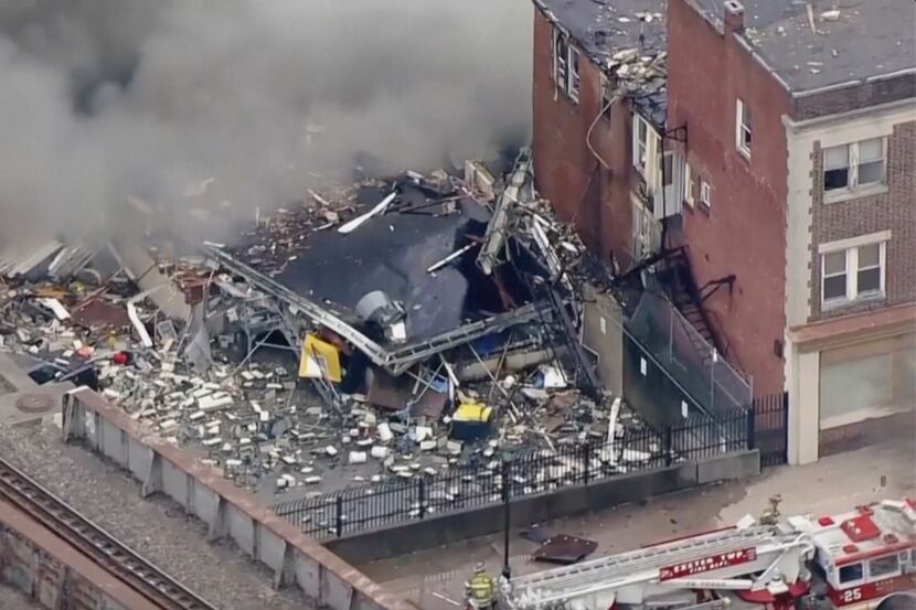 In this screen grab from video provided by WPVI-TV/6ABC, smoke rises from an explosion at...