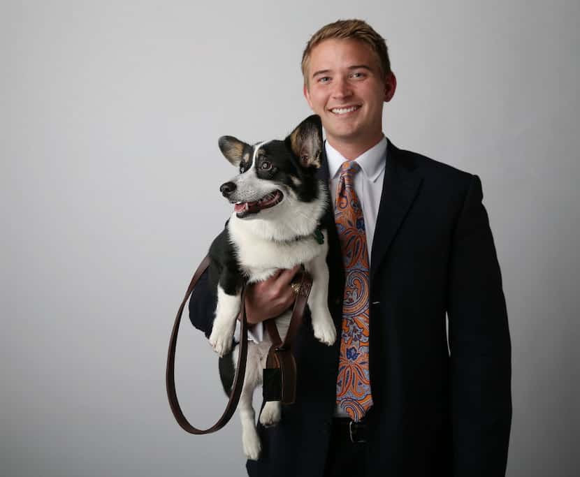 Criminal defense attorney Bryan Wilson stood for a portrait with his dog, Muffins, a...