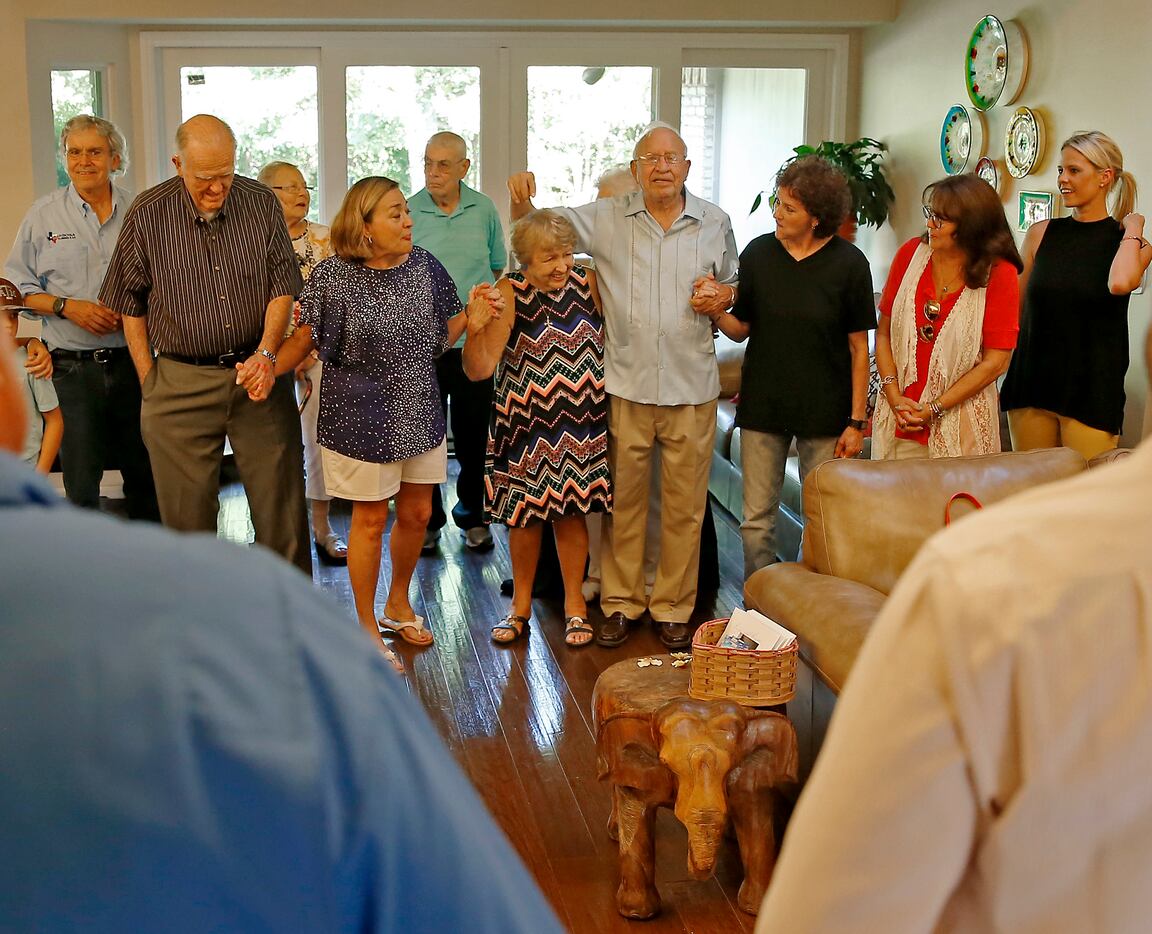 Family and friends of Frank and Carole Barbosa gathered for a prayer as they celebrated the...