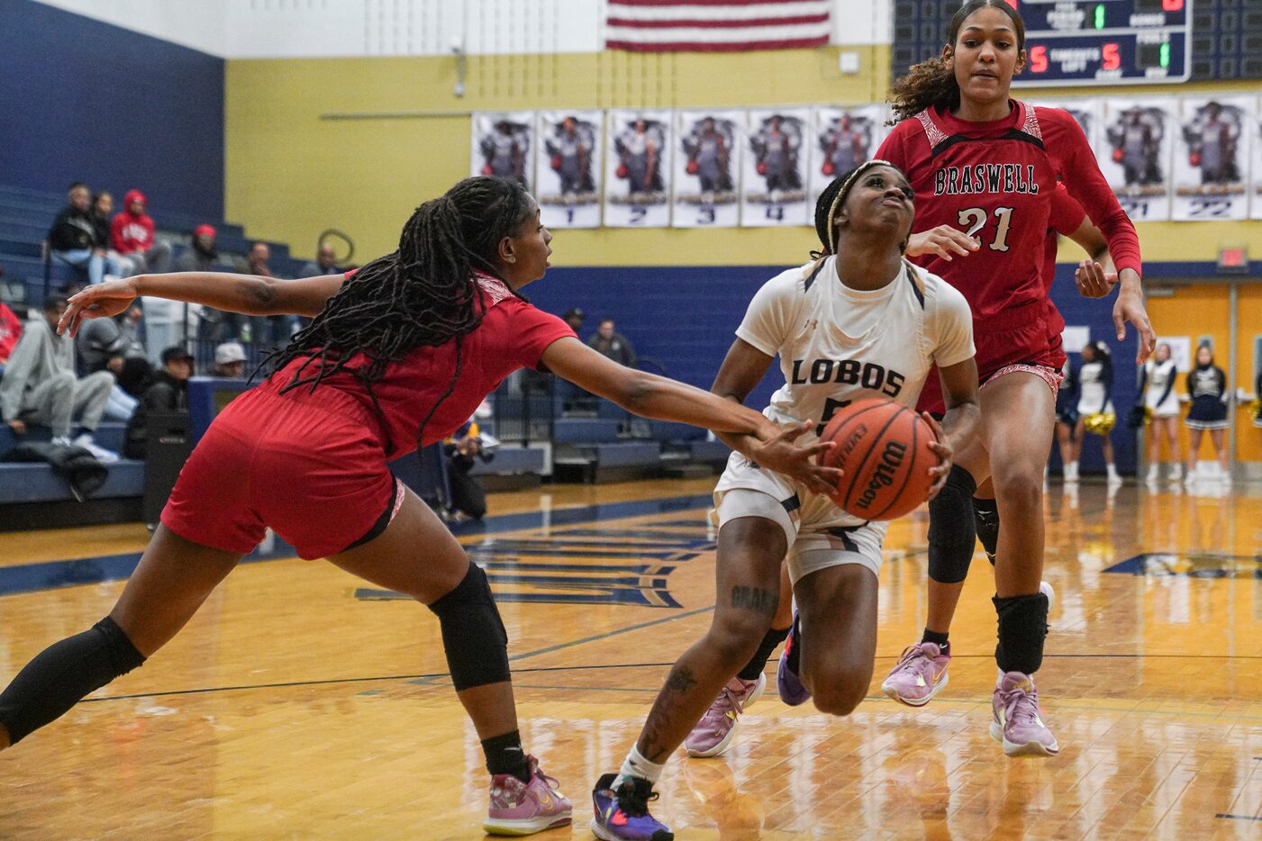 Little Elm High School’s  Madison Martin (5) dribbles through Denton Braswell High School’s...