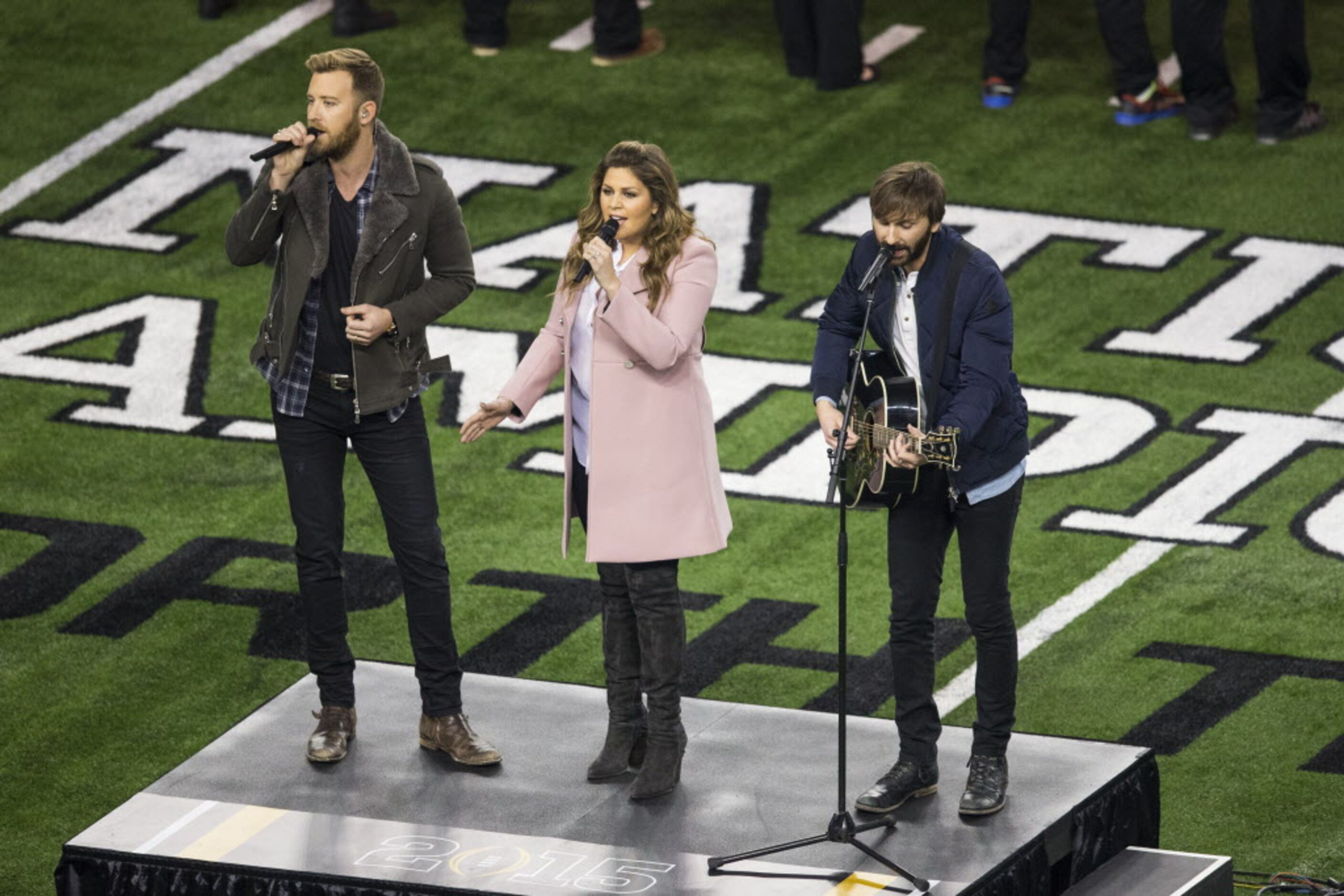 Lady Antebellum performs the national anthem before the College Football Playoff game at...