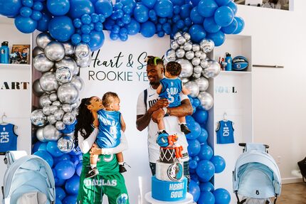 Mavericks forward Reggie Bullock and his girlfriend, Julissa, along with their twin sons...