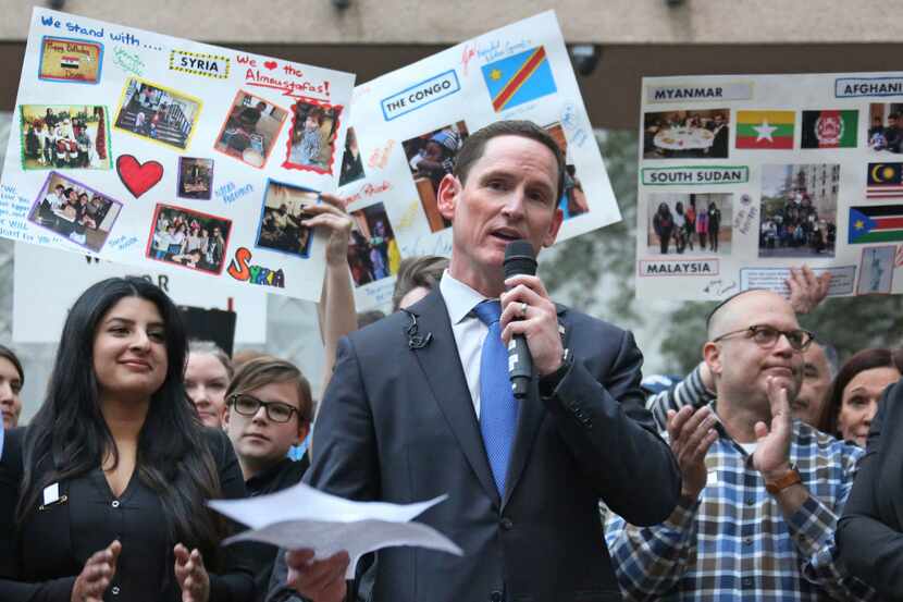 Dallas County Judge Clay Jenkins addresses a crowd  during the interfaith vigil to support...