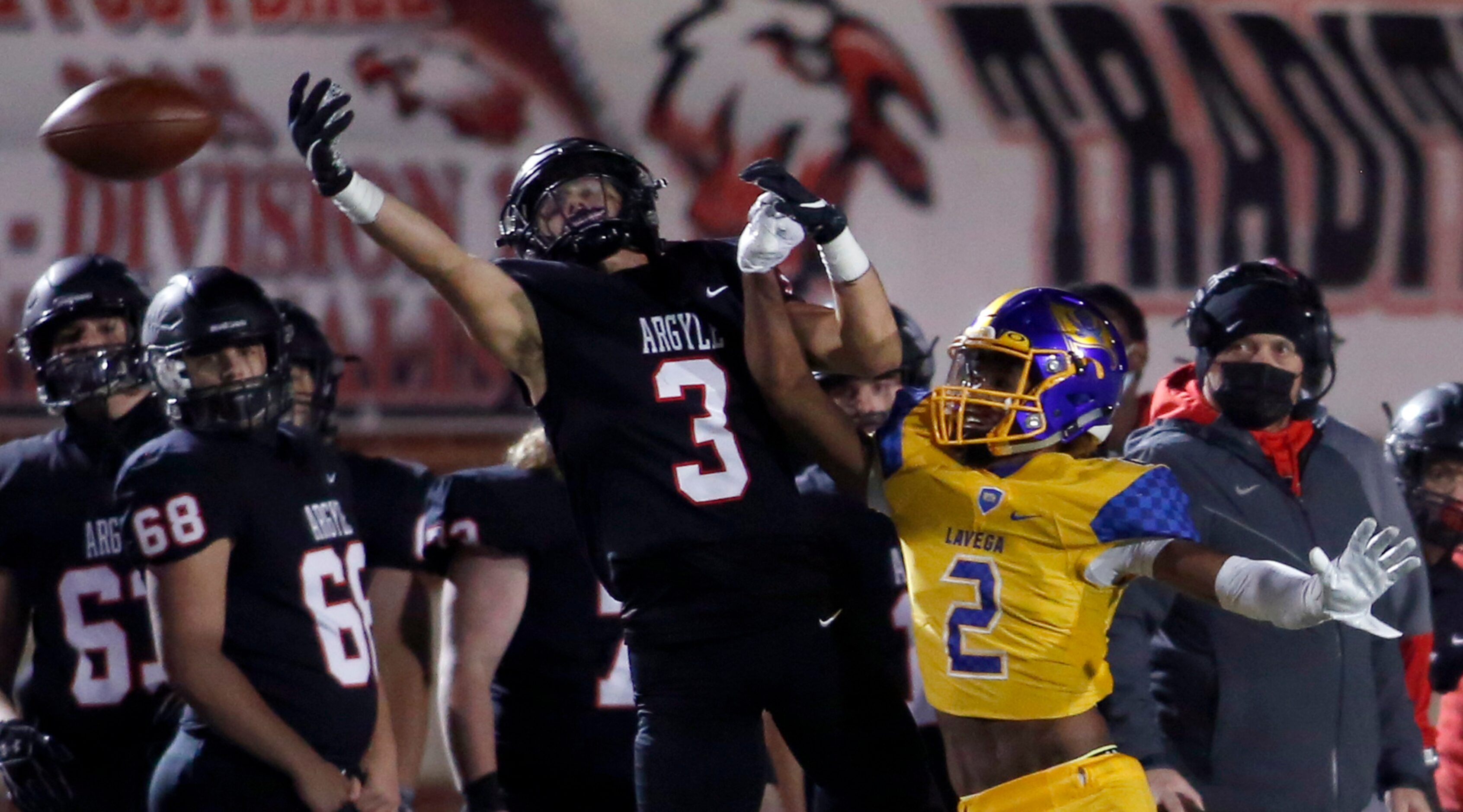 Argyle receiver Cash Walker (3) reaches but is unable to come up with the catch as he is...