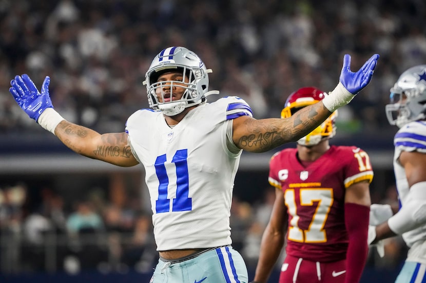 Dallas Cowboys outside linebacker Micah Parsons (11) celebrates after sacking Washington...