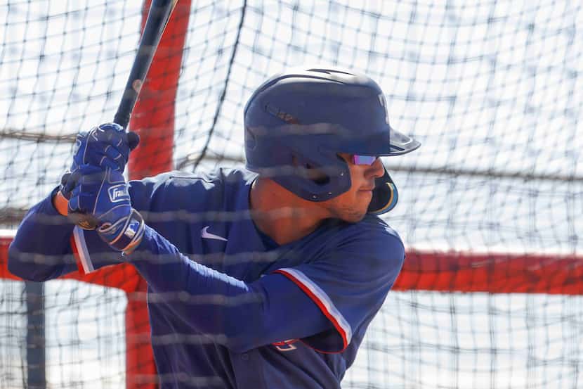 Texas Rangers minor league outfielder Anthony Gutierrez takes part in a batting practice...