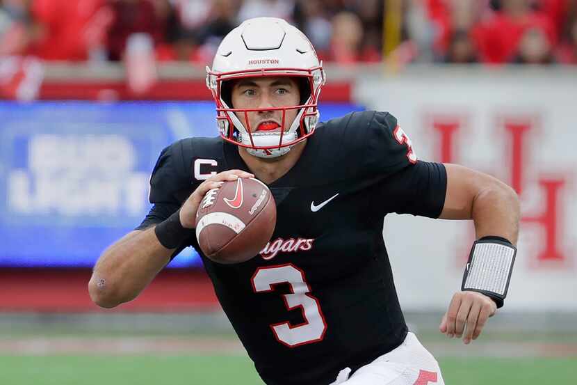 FILE - Houston quarterback Clayton Tune (3) plays during the first half of an NCAA college...