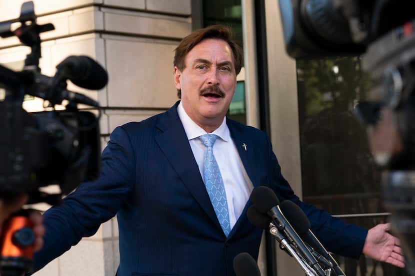 MyPillow chief executive Mike Lindell speaks to reporters outside federal court in...