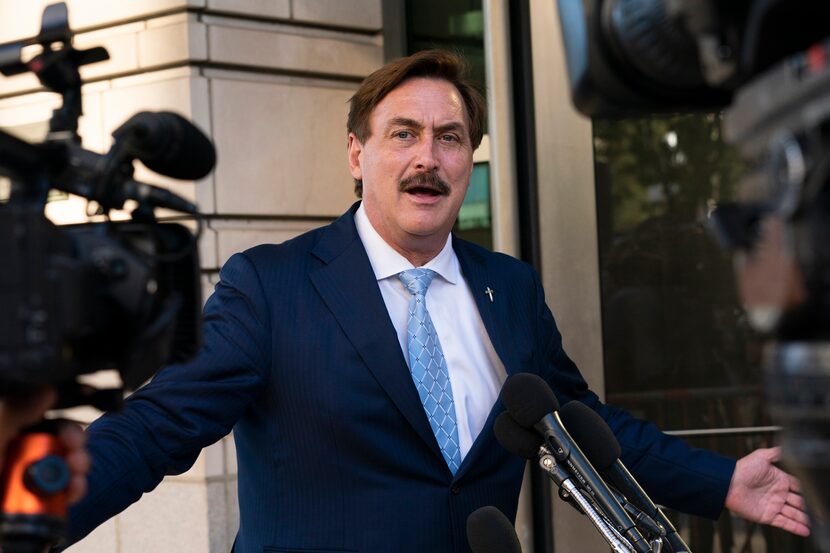 MyPillow chief executive Mike Lindell speaks to reporters outside federal court in...