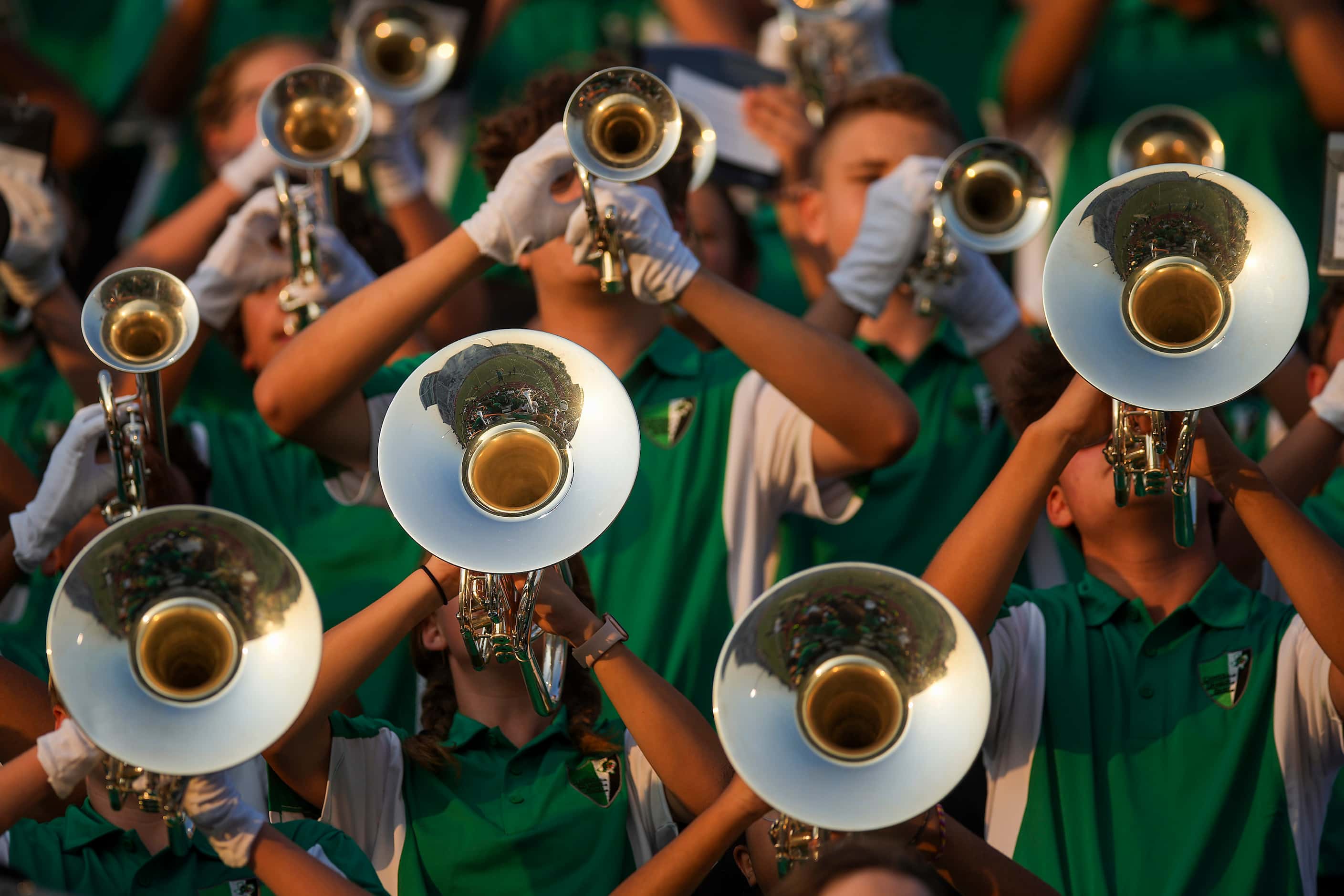 The Southlake Carroll band performs before a high school football game against...