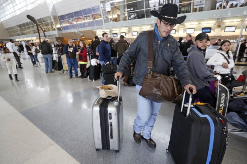 For Guiherme Pareira of São Paulo, Brazil, and others at D/FW Airport on Monday, travel was...