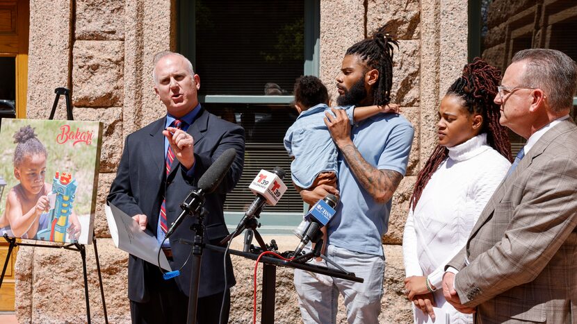 From left, attorney Brian Hargrove addresses reporters alongside Tariq Williams, Kayla...