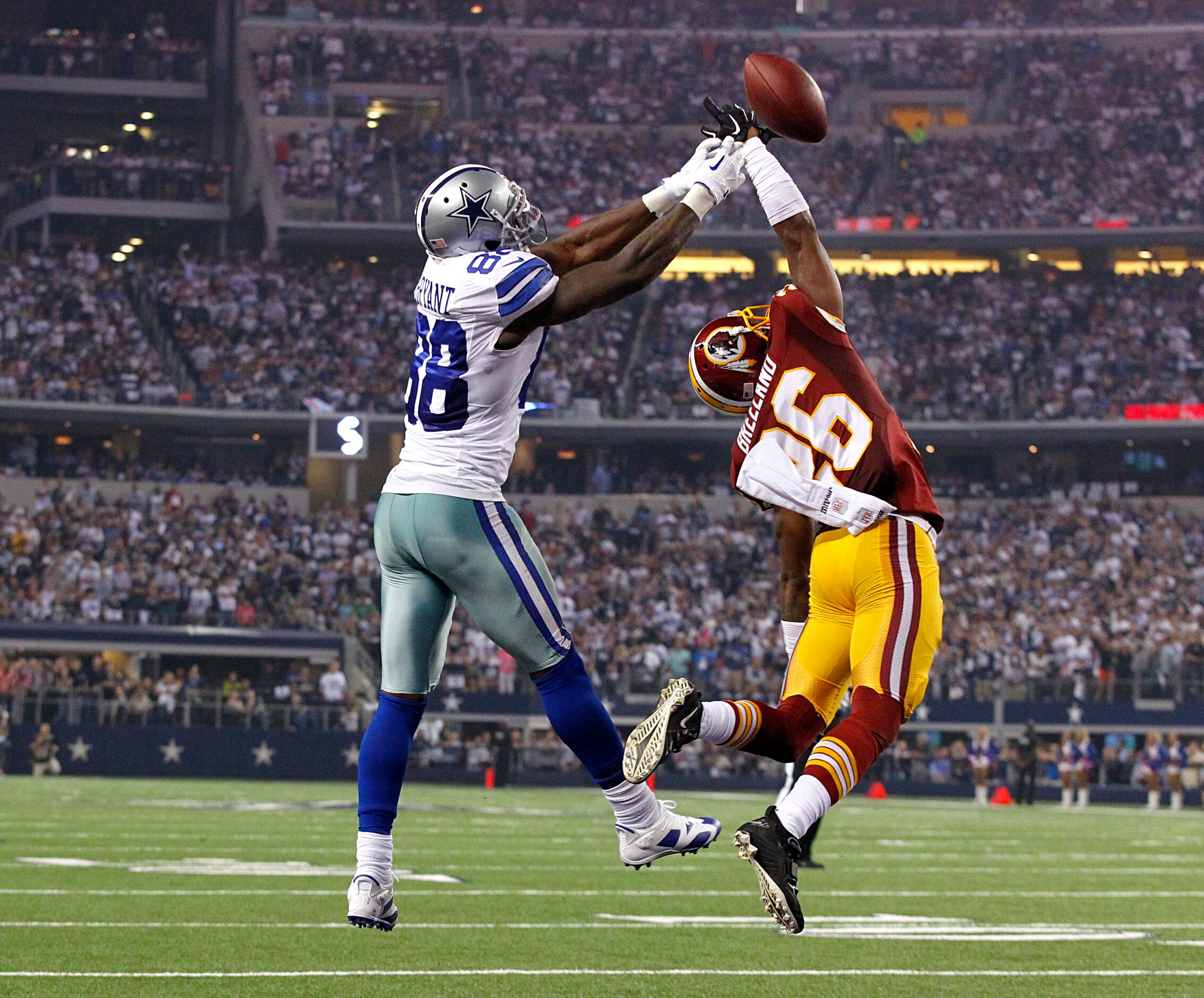 Dallas Cowboys wide receiver Dez Bryant (88) has a pass intended for him knocked away by...