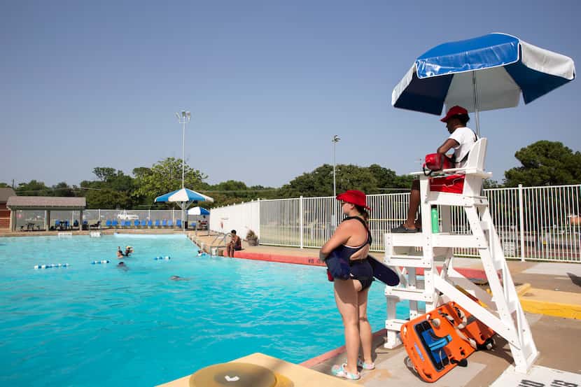 Lifeguards Cora Bennett, 16 (left) and Tommie Thompson, 18 (right) work at the Senter Park...