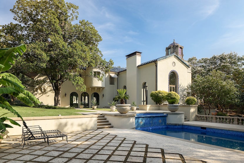 A view of the house from the sun deck shows the grandeur of the architecture and the grounds.