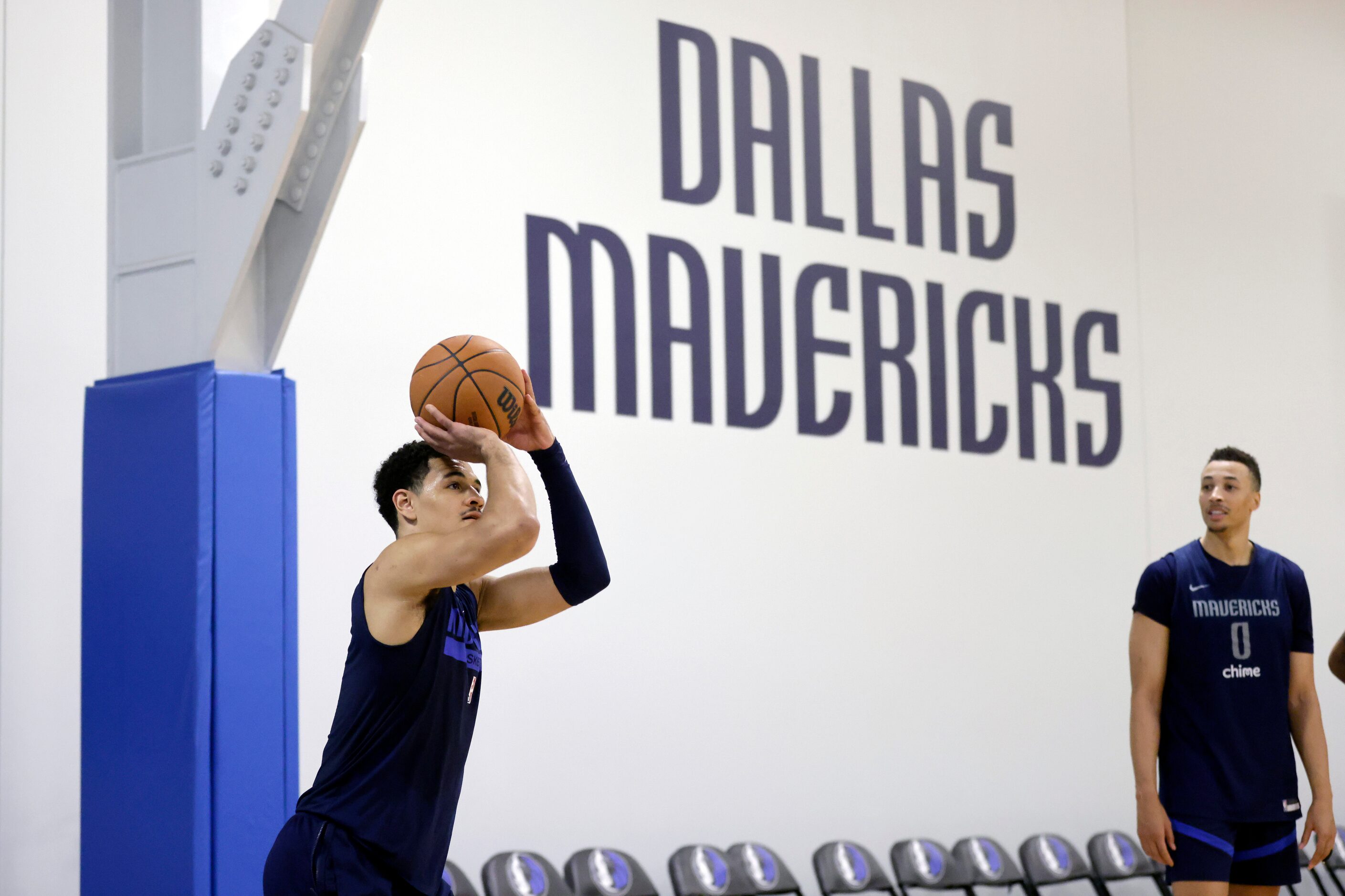 Dallas Mavericks guard Josh Green shoots 3-pointers during practice at their practice...