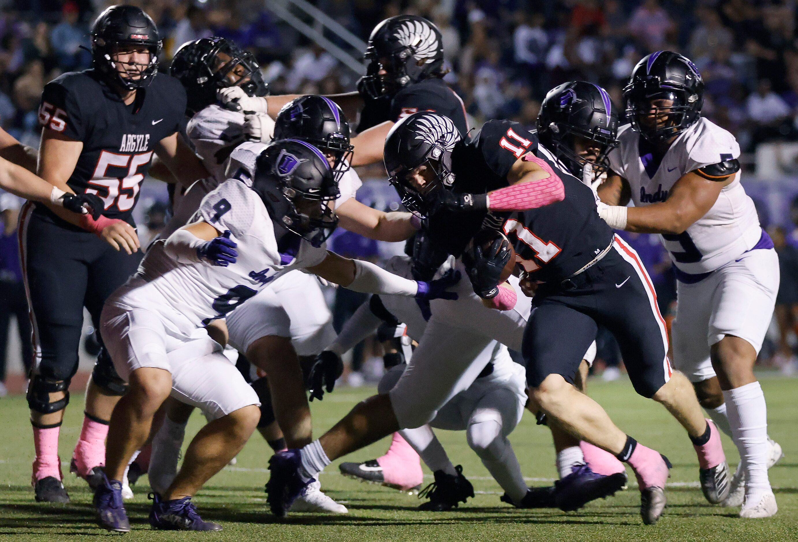 Argyle running back RJ Bunnell (11) runs around the end for a third quarter touchdown...