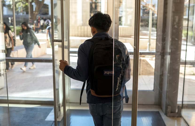 University of Texas at Austin student, Jose, leaves the Gates-Dell Complex after working in...