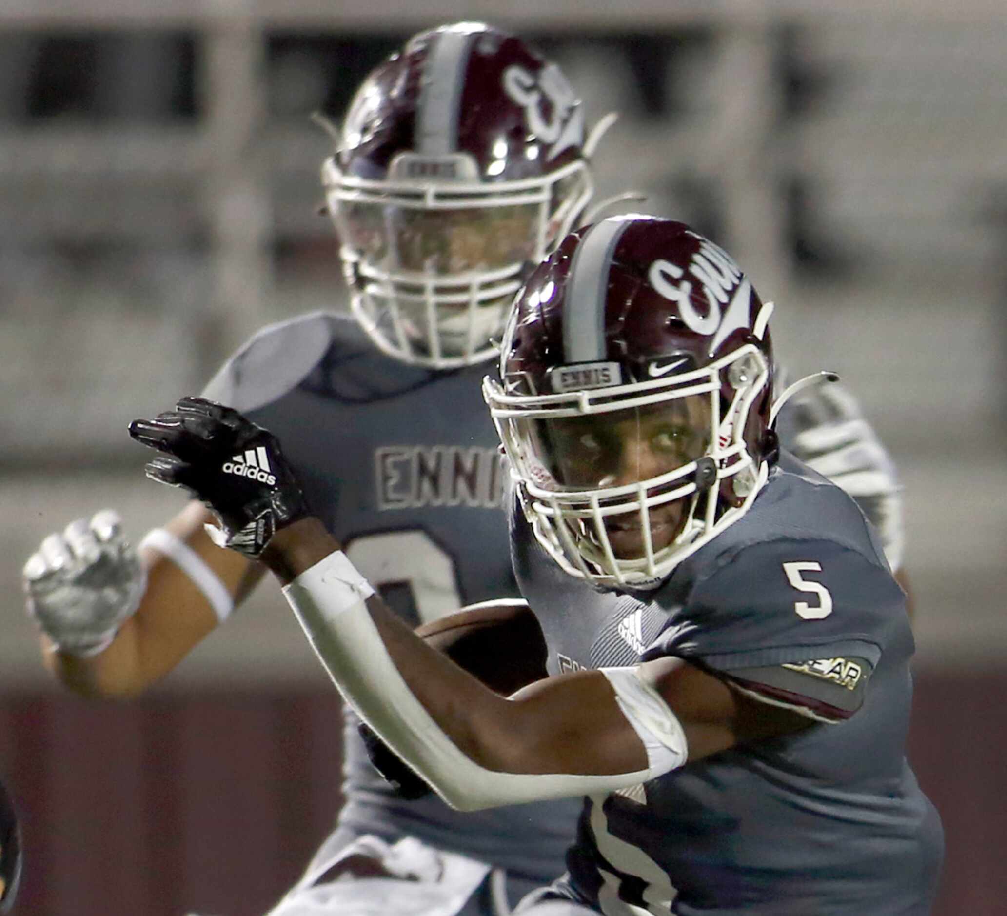 Ennis defensive back Stephon Townsend (5) changes his field after pulling in an interception...