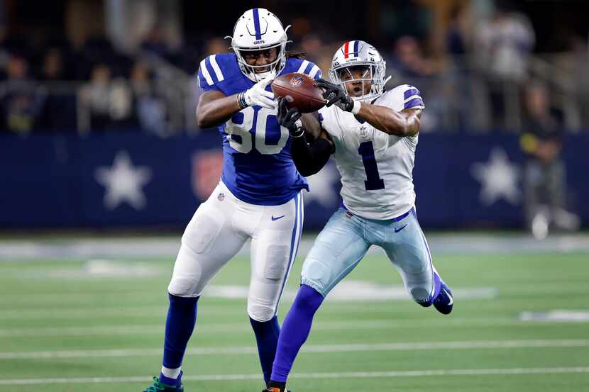 Dallas Cowboys cornerback Kelvin Joseph (1) nearly intercepts a pass intended for...