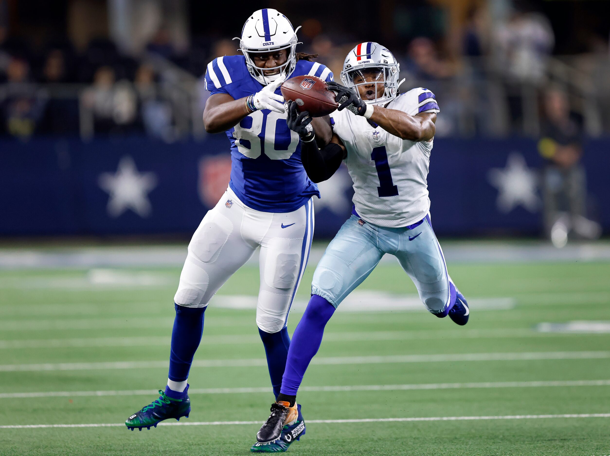 Dallas Cowboys cornerback Kelvin Joseph (1) nearly intercepts a pass intended for...