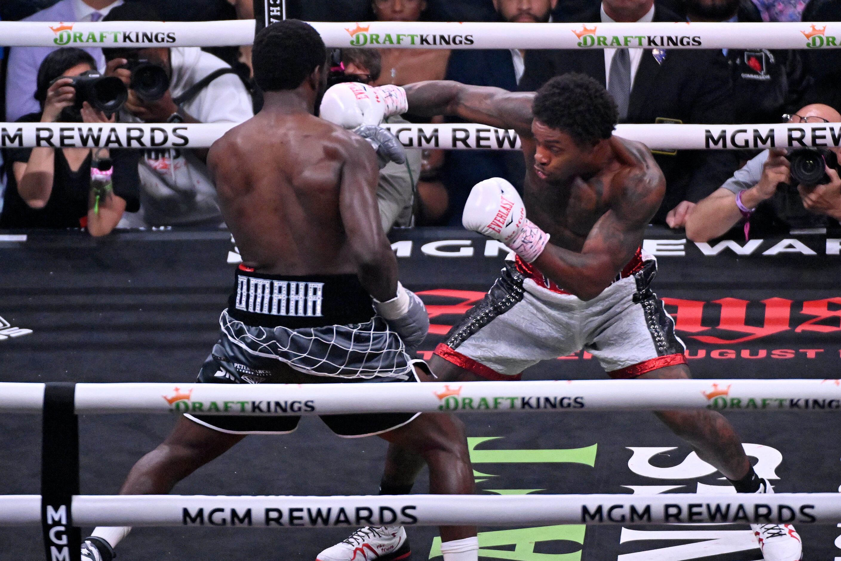 Errol Spence Jr., right, and Terence Crawford fight during their undisputed welterweight...