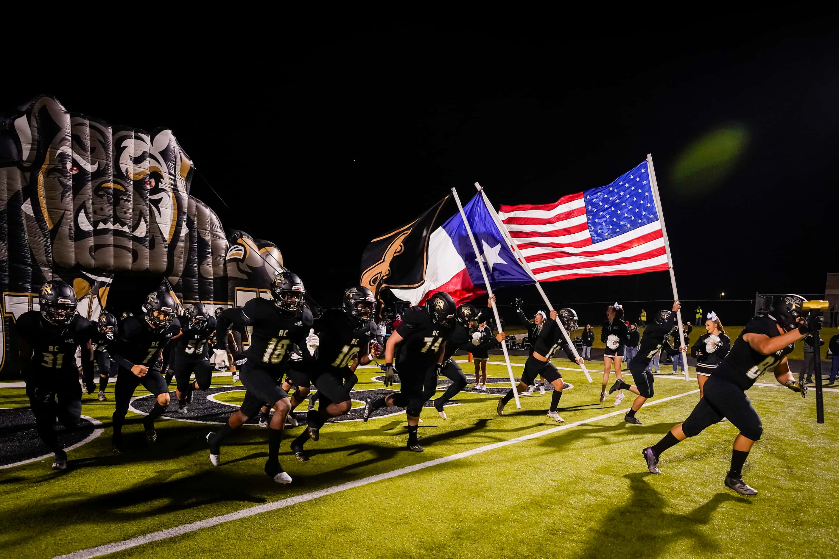 Royse City players take the field before a District 8-5A Division II high school football...