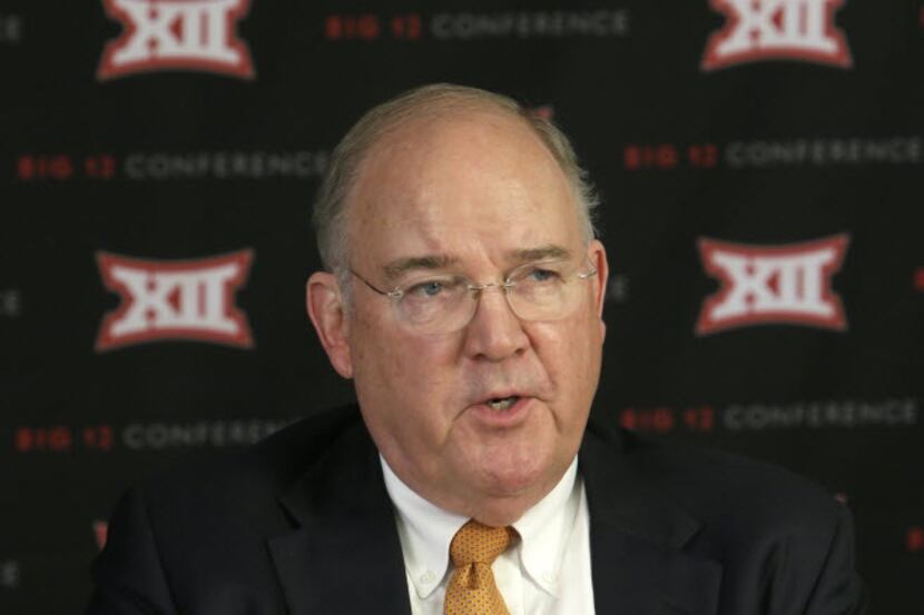 Texas Athletic Director Mike Perrin speaks to reporters after the Big 12 conference meeting...