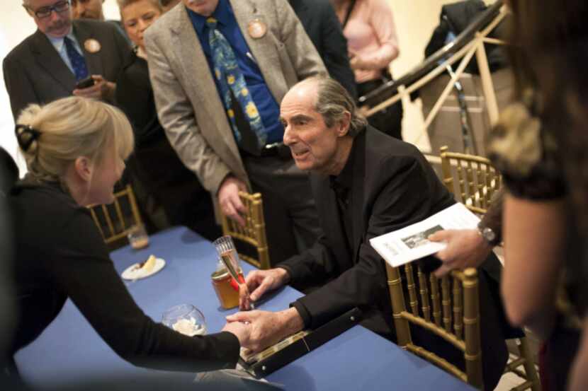 Author Philip Roth greets friends and fans during his 80th birthday party at the Newark...