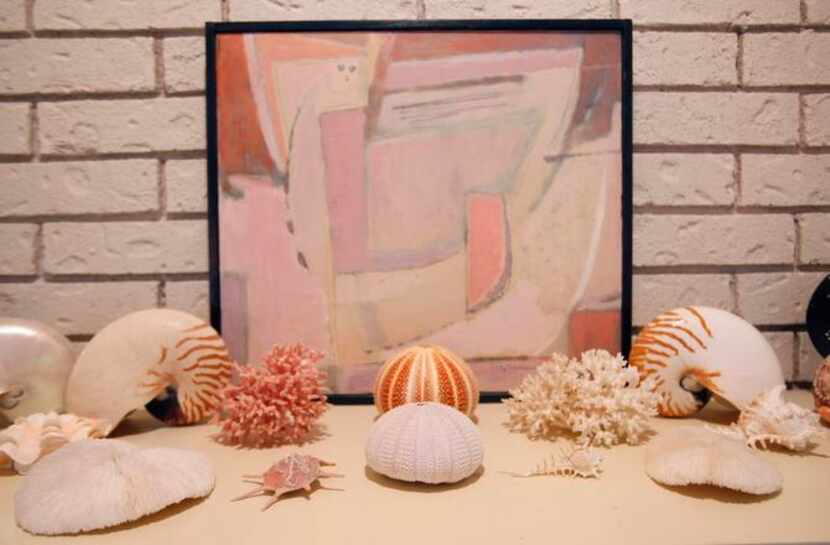 
Sheila Brenner's mantle decorated with a variety of shells from the Atlantic, Pacific and...