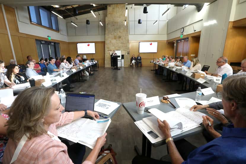 A 20-member task force meets to discuss Plano's short-term rental issues at the Oak Point...