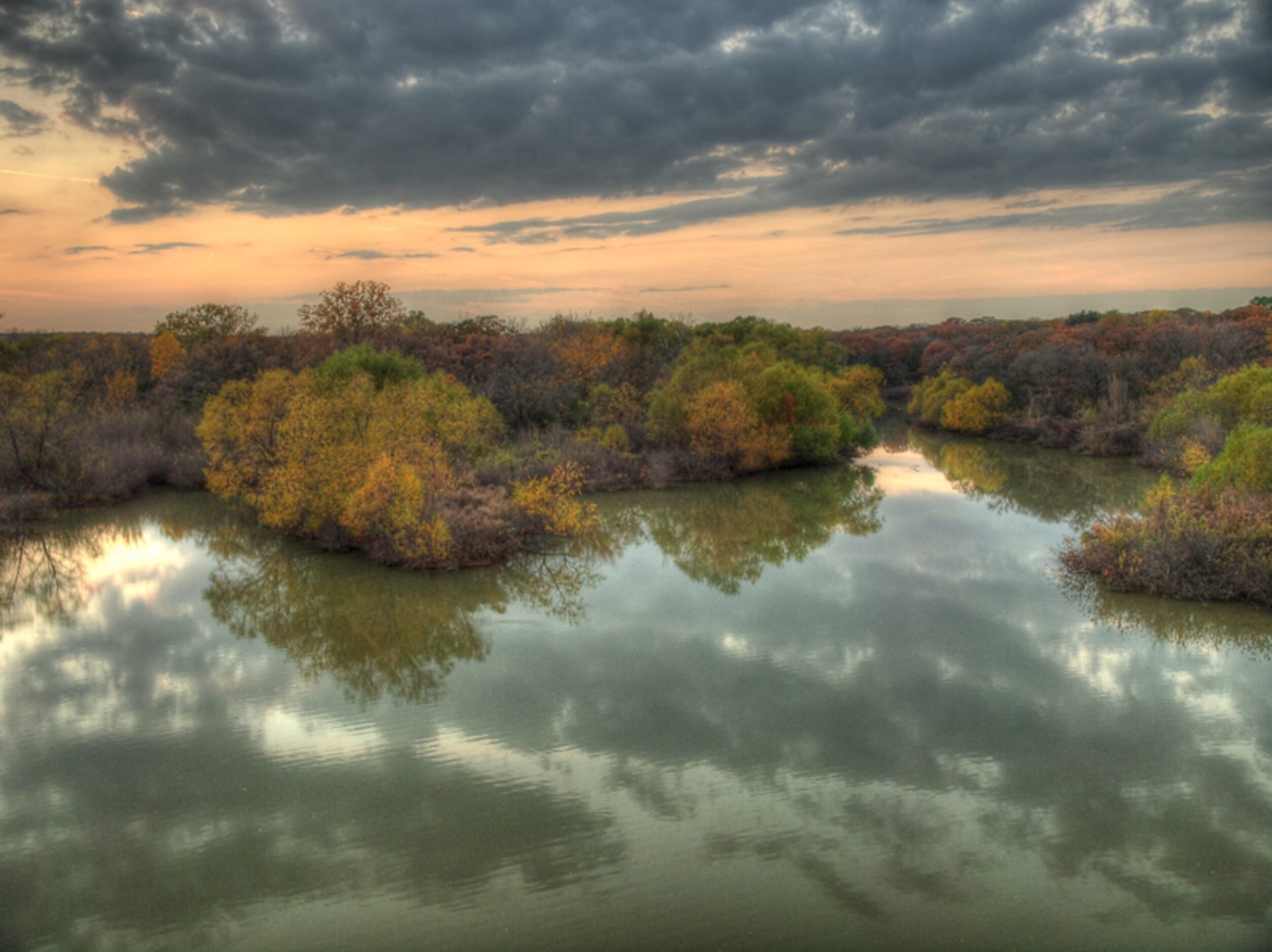 "Sunset" by Guy T. Phillips shows an evening along FM 2499.