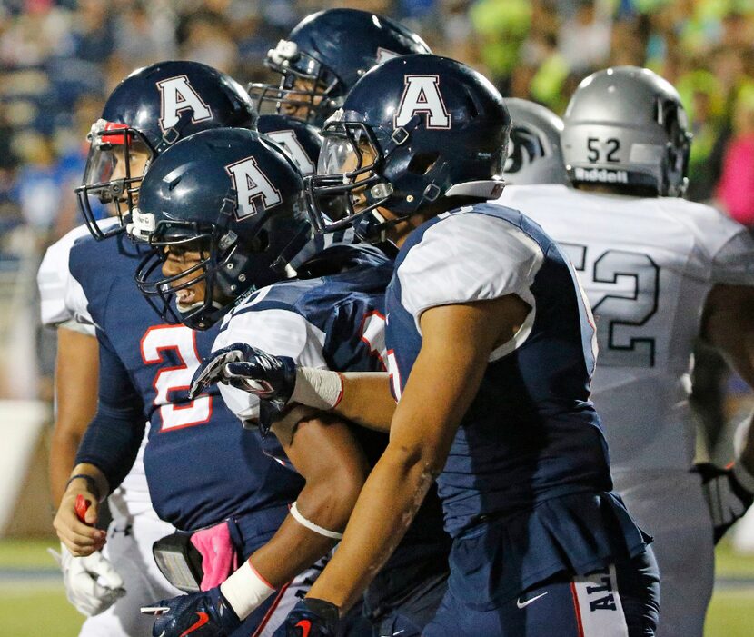 The Allen Eagles are all smiles after Theo Wease (10) recovered an offensive fumble in the...