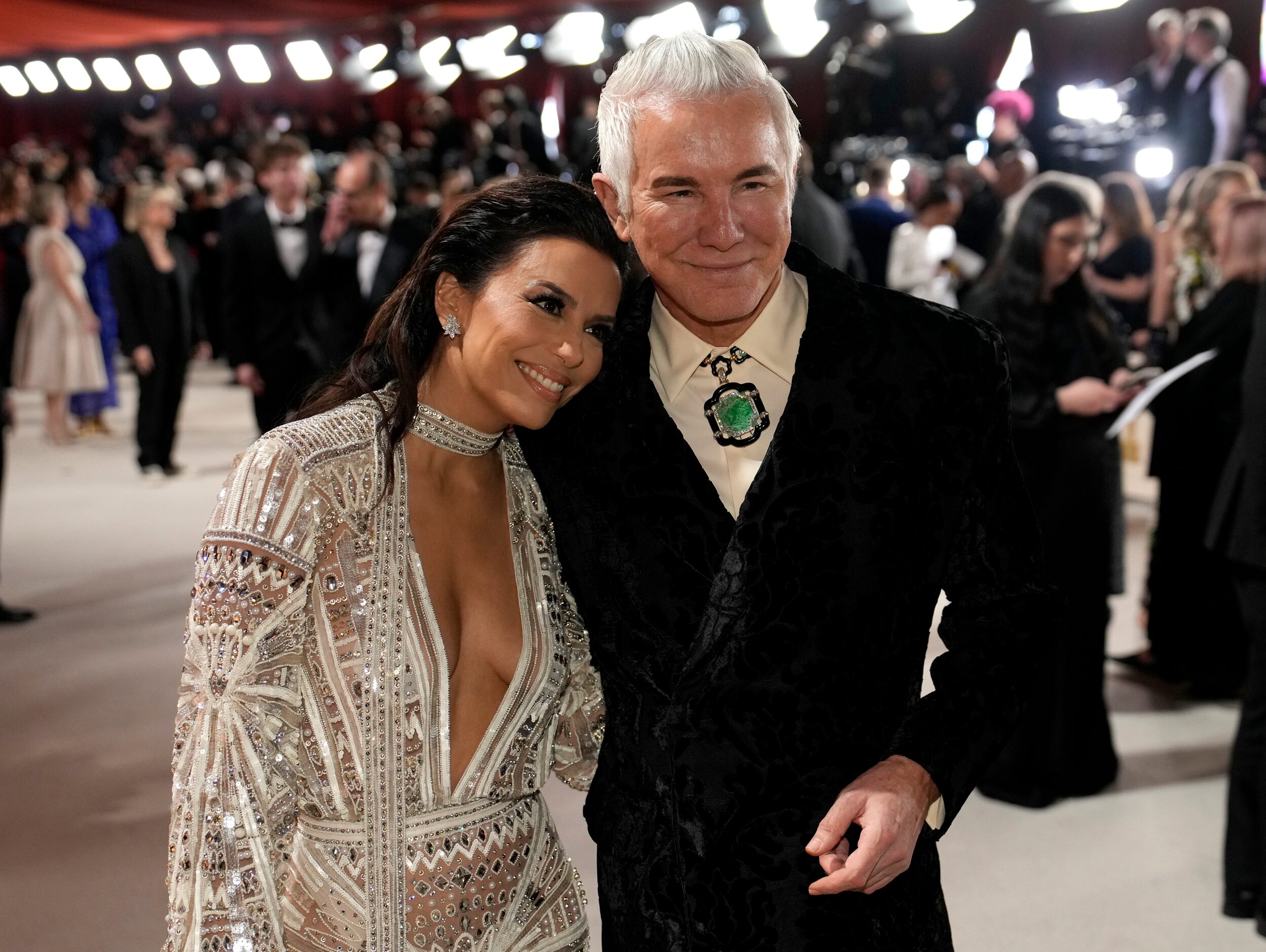 Eva Longoria, left, and Baz Luhrmann arrive at the Oscars on Sunday, March 12, 2023, at the...