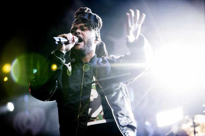 The Weeknd performs during the iHeartRadio Z100 Jingle Ball, an annual pop music showcase,...
