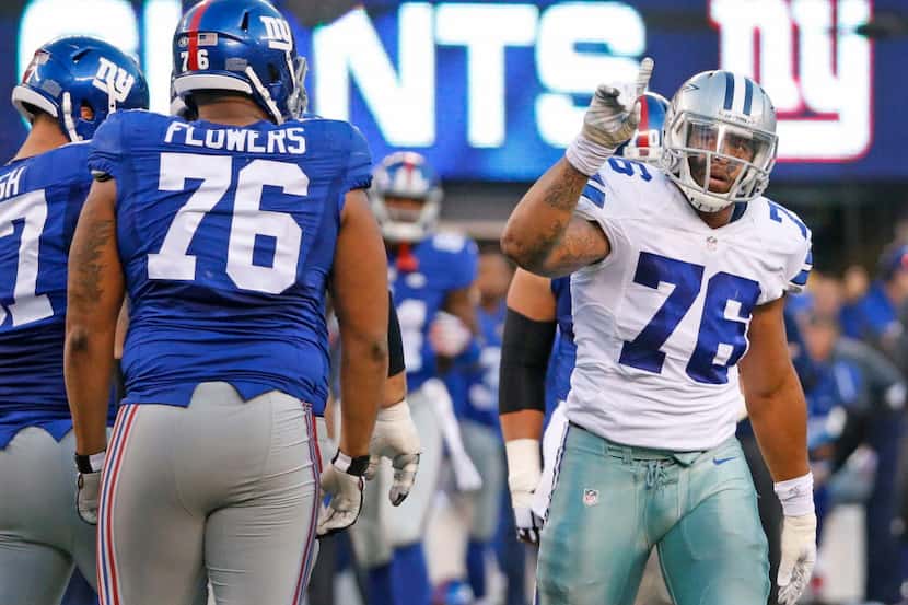 Dallas Cowboys defensive end Greg Hardy (76) reacts after sacking New York Giants...